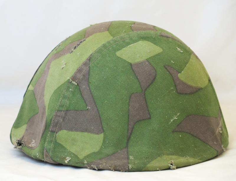 Post-war Finnish defense forces steel helmet M62 with camo cover