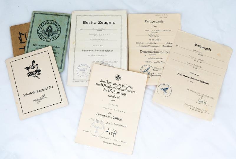 WW2 German Wehrmacht infantry and Panzer grenadier Gefreiter award documents - Iron cross 2nd class, infantry assault badges and Wound badge in black - France 1940, eastern-front 1942, Sicily and Italy 1944